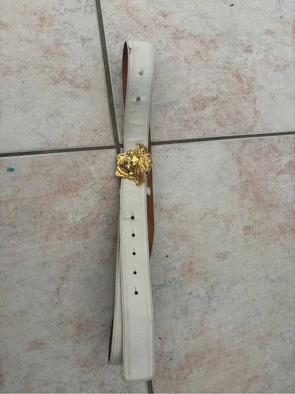 Versace down discolored